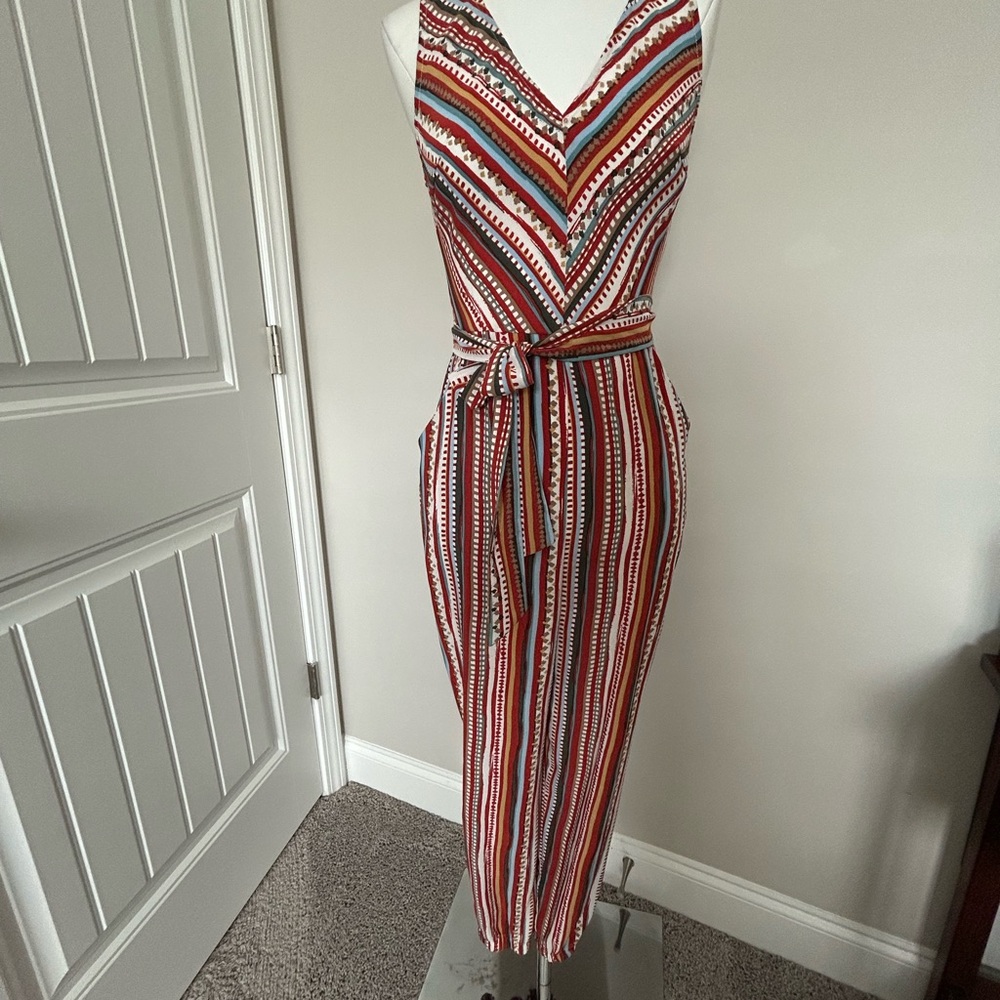 LUSH Orange Multi-Print Jumpsuit. New W/O tags. Small. Great fabric for travel!